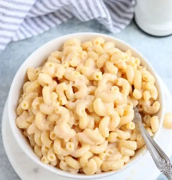 Creamy one-pot ricotta macaroni and cheese topped with herbs