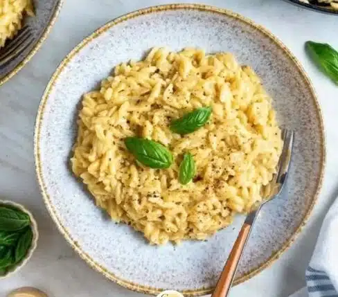 Delicious Orzo Mac and Cheese served in a bowl, ready to enjoy.
